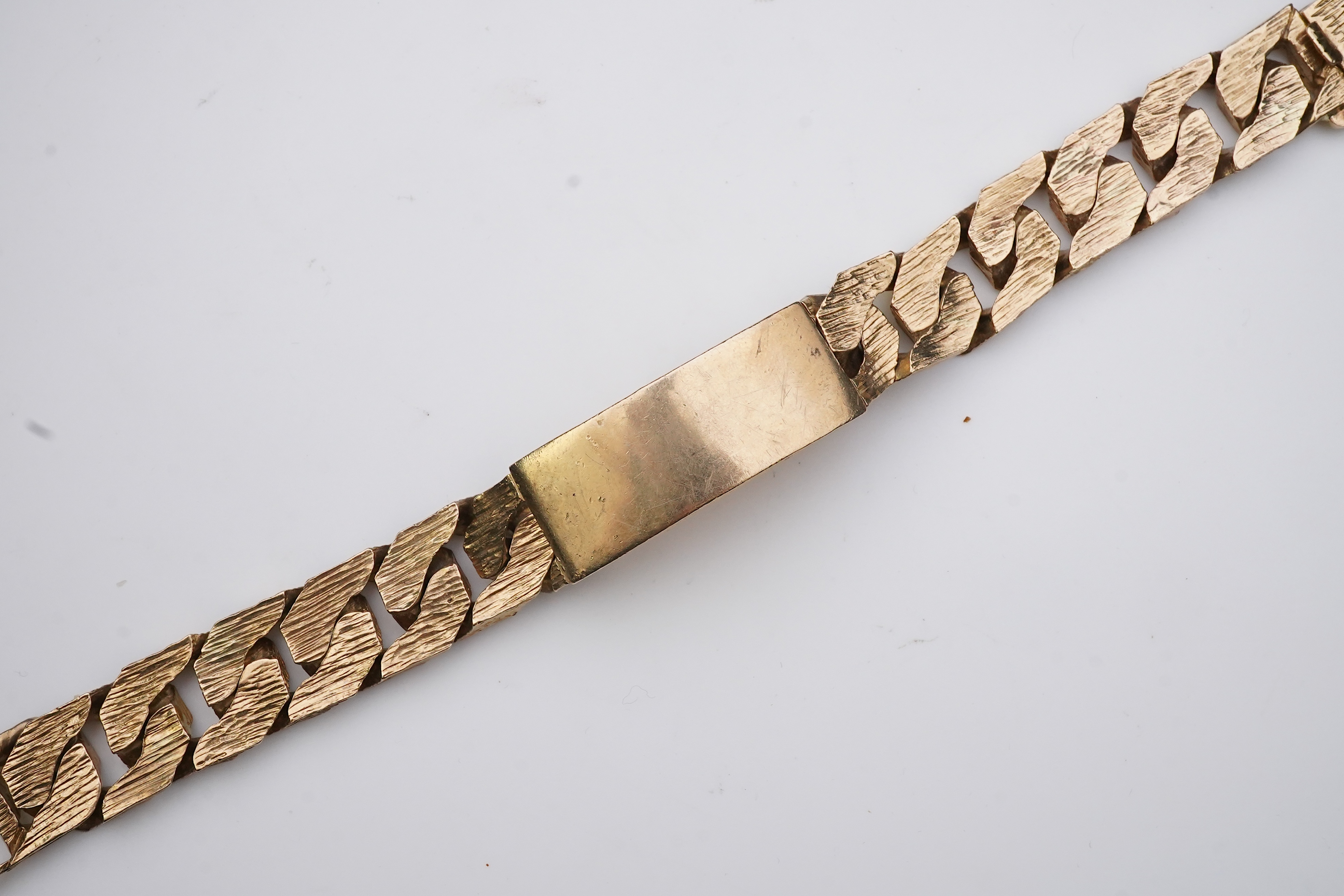 A 9ct gold identity bracelet, circa 1973